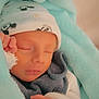 Diego participe au concours pour gagner de l'argent avec cette photo : baby, blanket, child, clothing, cozy, cute, face, hand, hat, indoors, infant, newborn, peaceful, portrait, rest, sleeping, soft, toddler, warm, wrapped
