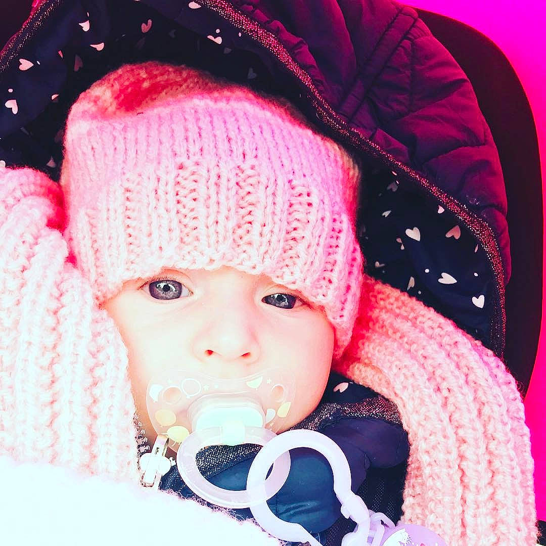 Eugénie a rejoint le concours — aidez-le/la à gagner de superbes lots ! beanie, bonnet, cap, cheek, child, ear, eye, girl, headgear, infant, knit_cap, lip, magenta, mouth, nose, organ, person, pink, product, toddler