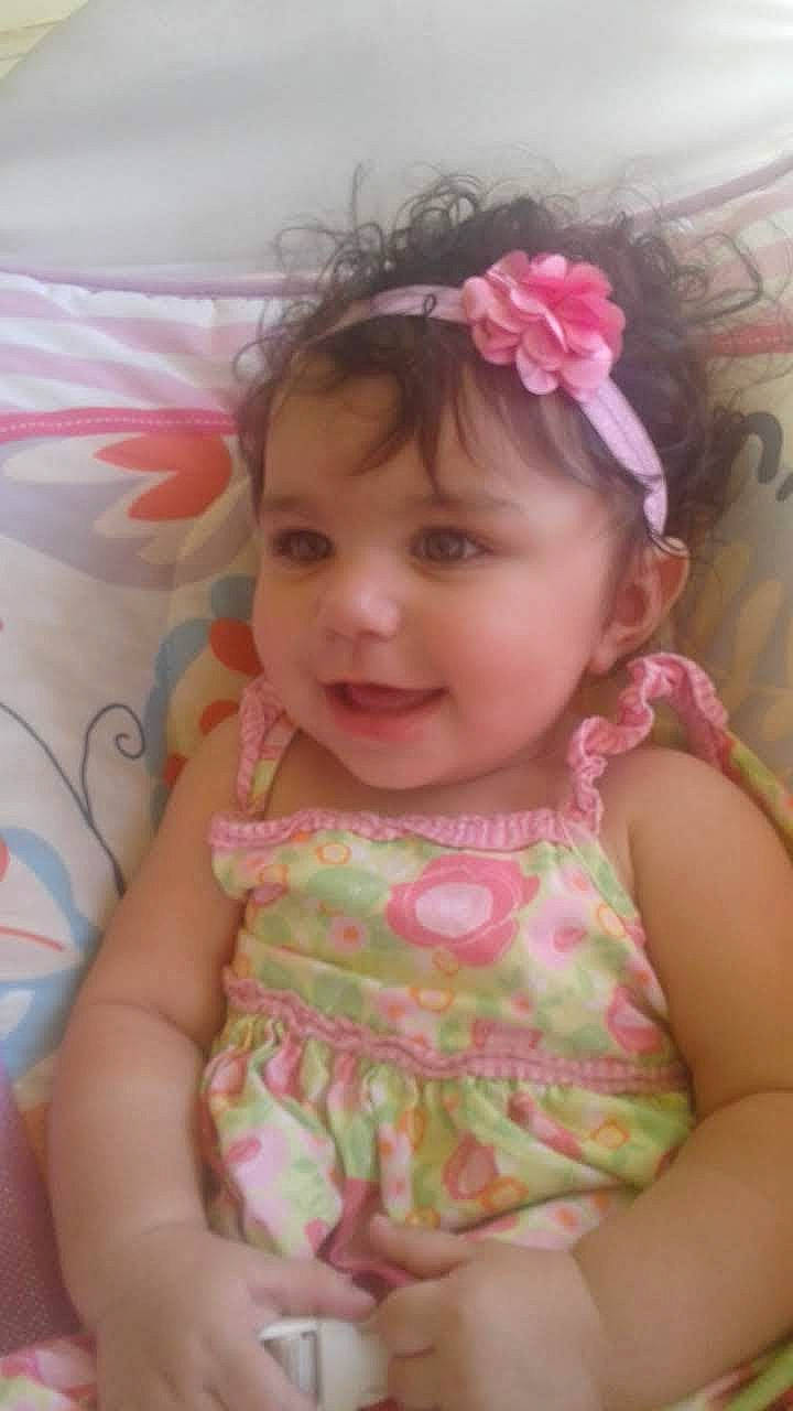 Mckayla is registered to the contest to win money with this photo: baby, cheek, child, face, fashion_accessory, hair_accessory, head, headband, headgear, person, pink, skin, smile, toddler