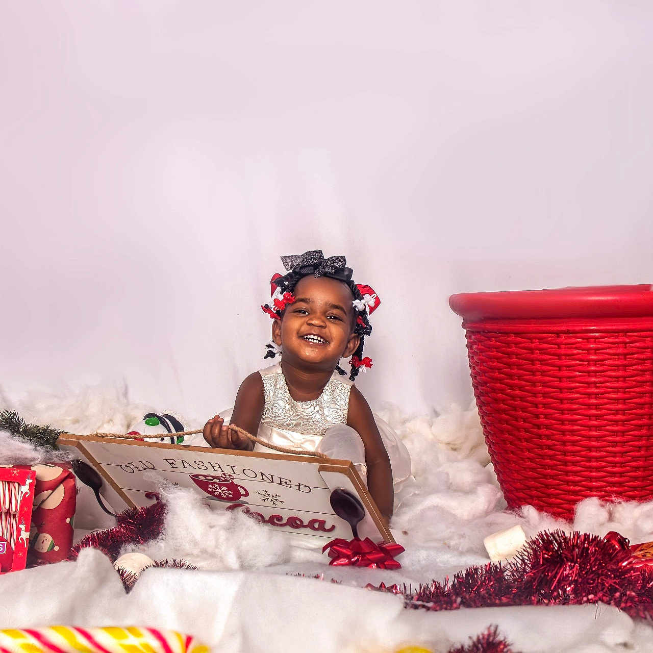 Azariah joined the competition — help win amazing prizes! baby, basket, candy, child, cup, face, female, festival, food, girl, happy, head, openingpresent, person, photography, portrait, reading, sitting, smile, sweets