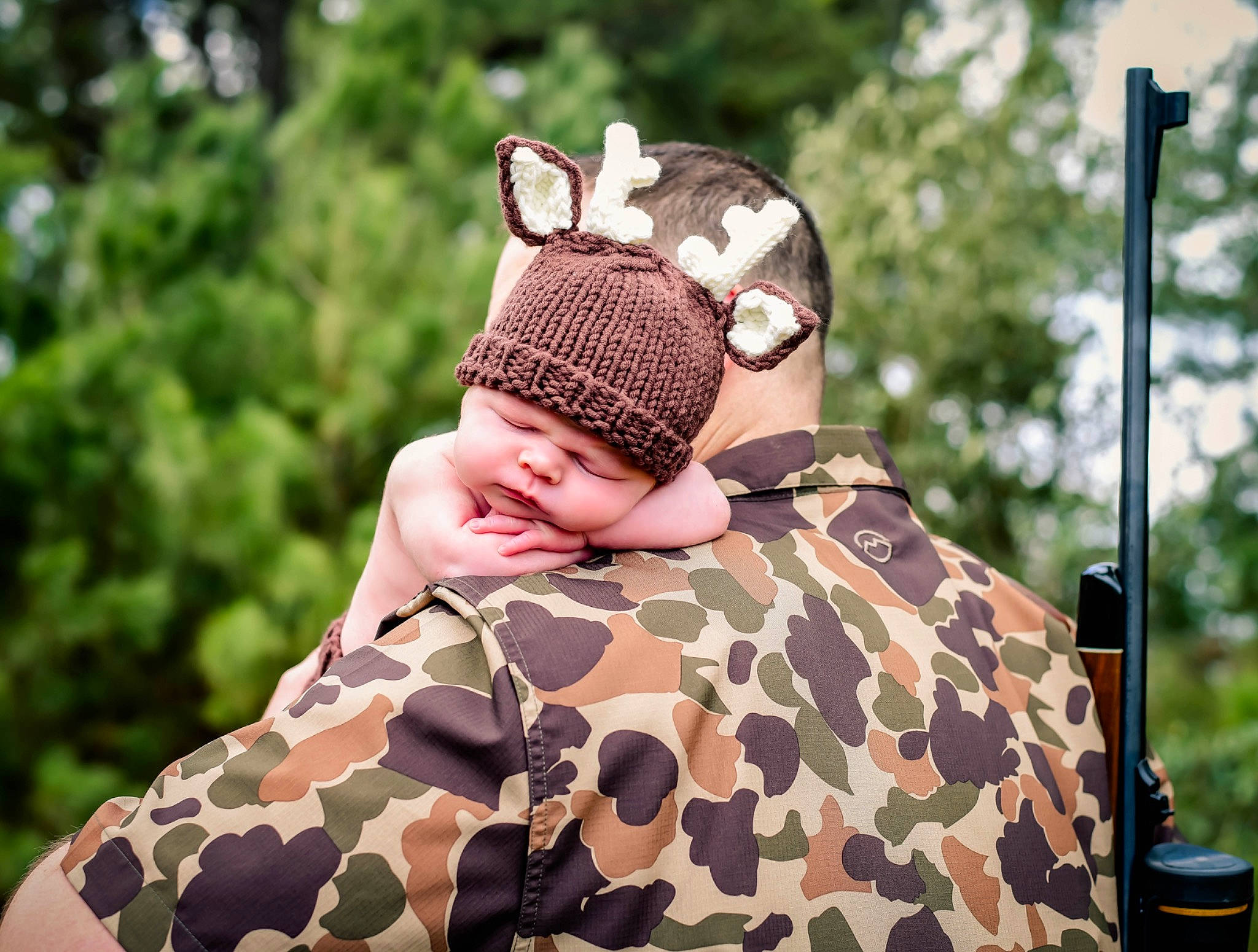 Bryson is registered to the contest to win money with this photo: camouflage, cap, child, crown, eyewear, fashion_accessory, fur, grass, hair_accessory, headgear, headpiece, headwear, knit_cap, marines, military_camouflage, military_uniform, pattern, person, personal_protective_equipment, sleeve