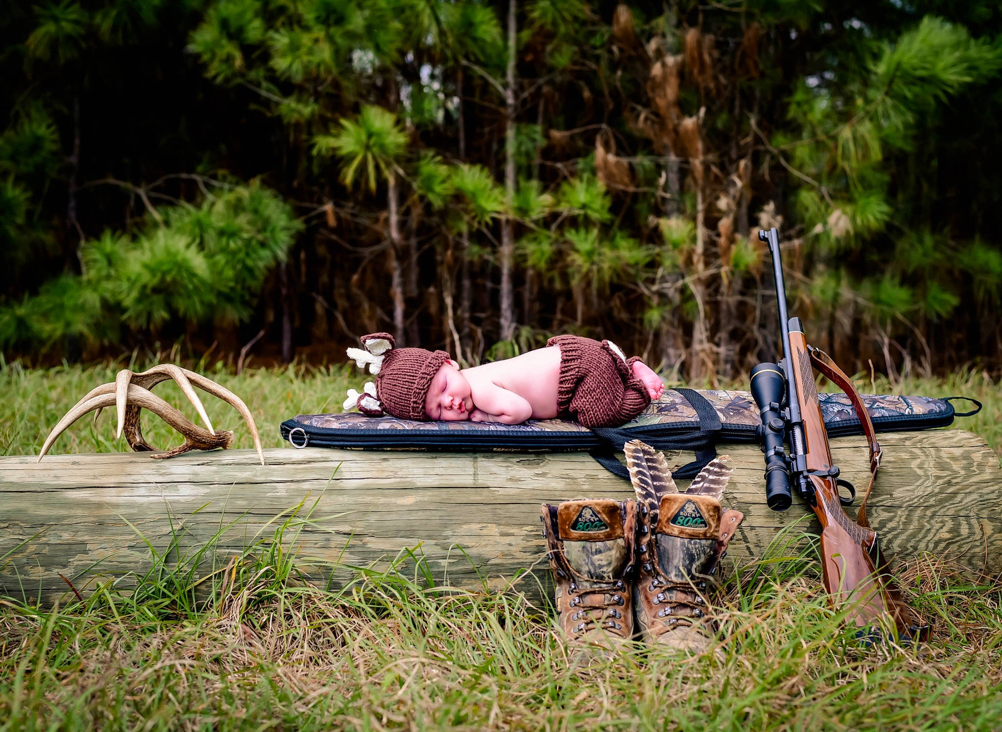 Bryson is registered to the contest to win money with this photo: forest, grass, grassland, headwear, jungle, landscape, leisure, natural_landscape, outdoor_bench, outdoor_furniture, people_in_nature, person, plant, plant_community, recreation, sitting, soil, tree, wildlife, wood