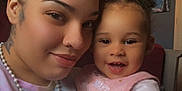 Elena joined the competition — help win amazing prizes! woman, toddler, smile, selfie, indoor, portrait, child, person, curtain, artwork, room, clothing, pink, happy, face, hair, jewelry, bib, baby, casual