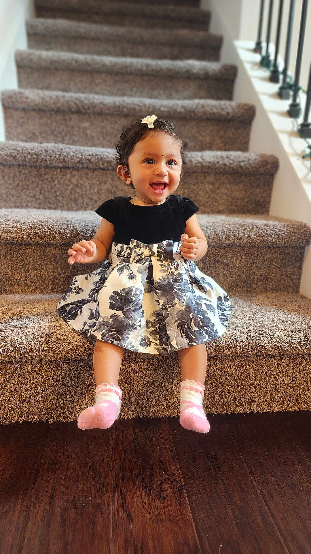 Soha joined the competition — help win amazing prizes! baby, child, smiling, stairs, carpet, dress, sock, pink, hair_clip, happy, indoor, floor, wood, person, cute, sitting, infant, small, portrait, young
