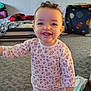 Tehleyiah joined the competition — help win amazing prizes! toddler, child, smile, pajamas, indoor, carpet, bed, blanket, happy, person, face, clothing, young_child, cute, room, home, floor, toy, pattern, hair