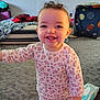 toddler, child, smiling, indoors, pajamas, carpet, face, happy, standing, room, baby, clothing, person, floor, toy, diaper, expression, home, cute, young
