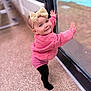 baby, child, girl, bow, pink_sweater, black_tights, standing, glass_door, pool, outdoor, smile, happy, headband, window, floor, reflection, person, cute, portrait, toddler