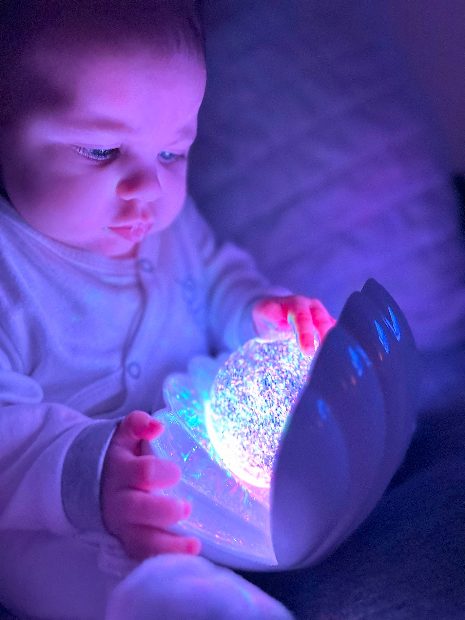 Isabella-rose is registered to the contest to win money with this photo: baby, baby_toddler_clothing, carmine, child, cloud, darkness, dress, electric_blue, finger, fun, hand, happy, magenta, nail, person, pink, purple, sitting, toddler, violet