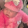 baby, sleeping, pink, hat, bow, knitwear, hand, couch, indoor, child, person, cute, soft, warm, cozy, fuzzy, clothing, infant, rest, comfort