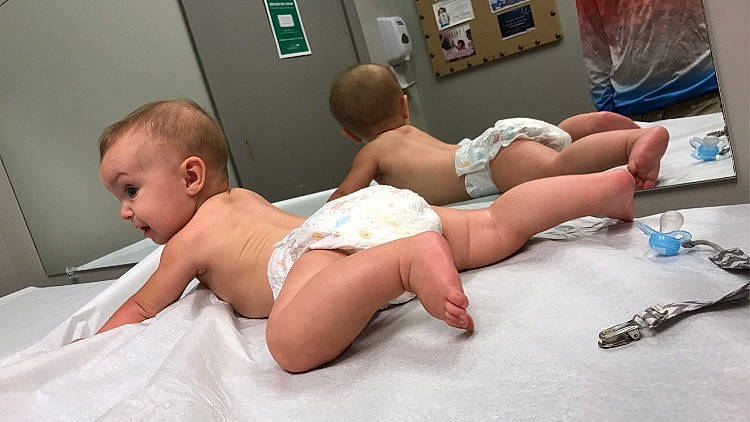 Jaxson is registered to the contest to win money with this photo: abdomen, arm, baby, chest, child, comfort, diaper, finger, foot, human_body, human_leg, joint, knee, leg, muscle, person, skin, stomach, thigh, toddler