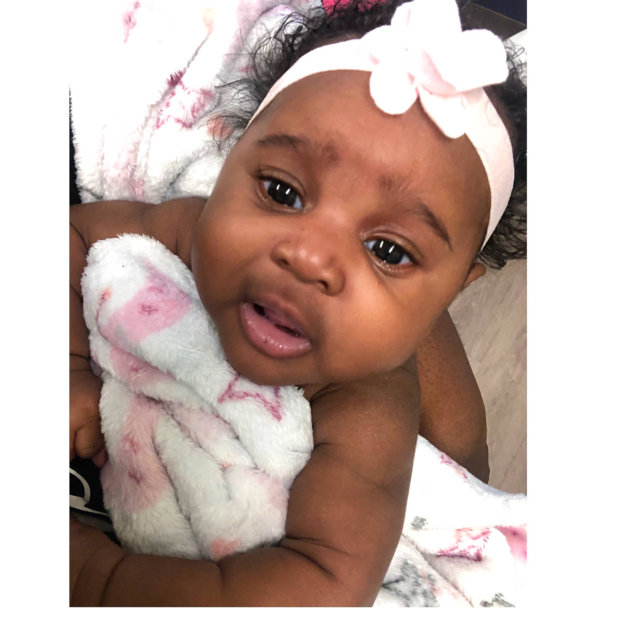 Yuri Giselle is registered to the contest to win money with this photo: baby, cap, child, eyebrow, eyelash, fashion_accessory, finger, gesture, happy, headband, headpiece, magenta, nail, person, petal, pink, product, smile, thumb, toddler