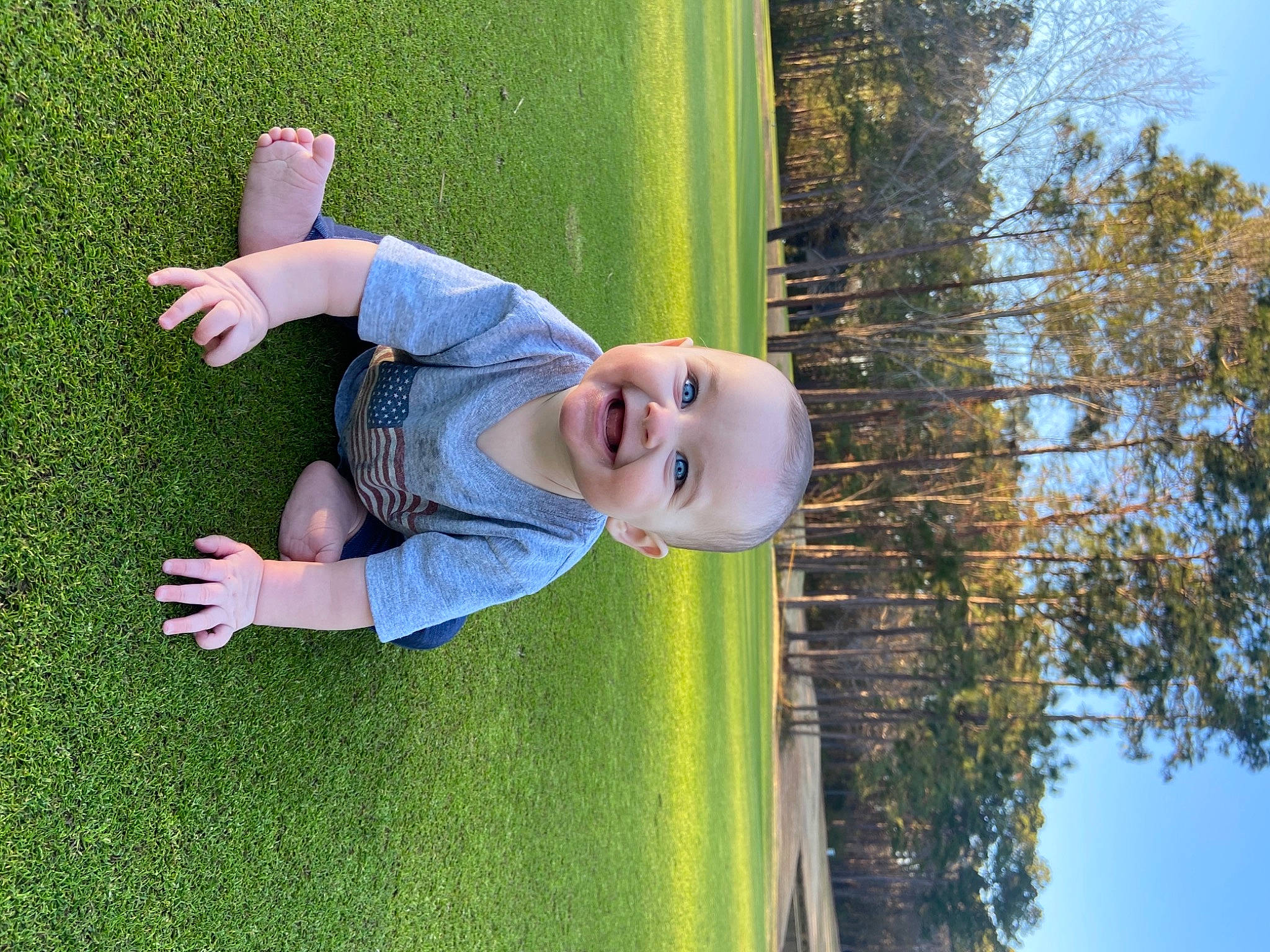 Hadley joined the competition — help win amazing prizes! artificial_turf, baby, child, fun, garden, gesture, grass, grassland, happy, joy, lawn, leisure, people_in_nature, person, plant, play, recreation, shrub, sky, smile