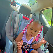 Skye joined the competition — help win amazing prizes! automobile, beads, car_interior, car_seat, child, cute, daylight, expression, hair, kid, person, portrait, purple_top, safety, seat, seatbelt, toddler, travel, window, young_child