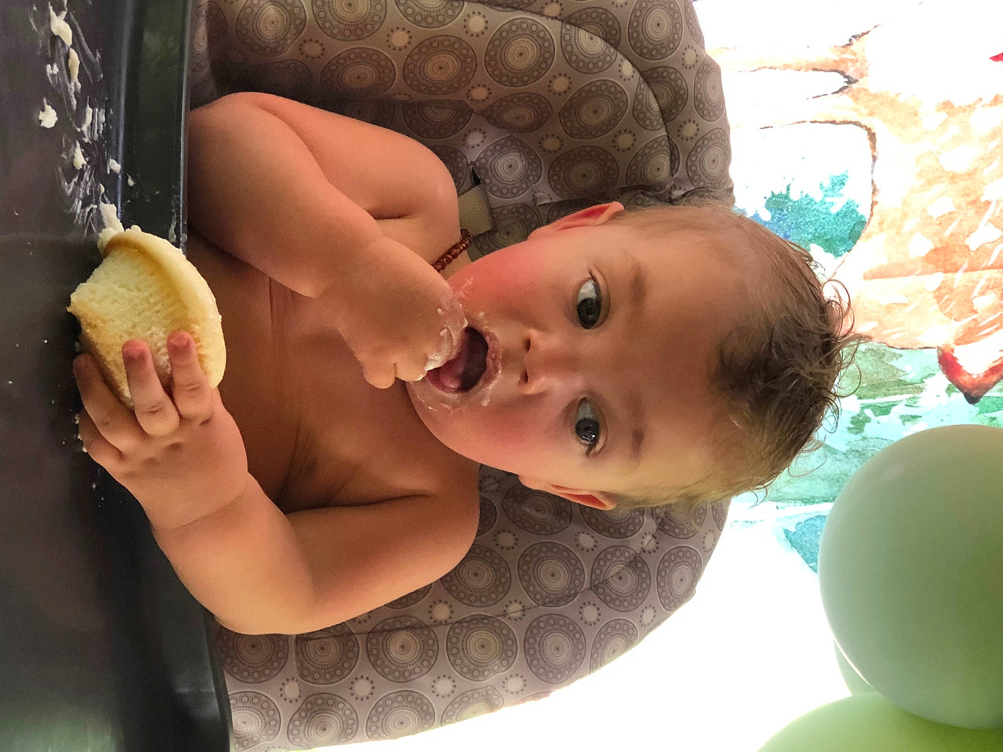 Hank Barrett is registered to the contest to win money with this photo: abdomen, arm, baby, bathing, chest, child, elbow, eyelash, food, fruit, fun, hand, happy, human_body, mouth, nose, person, skin, surprise, toddler