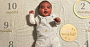 Kyeson joined the competition — help win amazing prizes! baby, infant, milestone_blanket, months, 2_months, romper, striped_clothing, cute, smiling, raised_fists, lying_down, indoor, fabric_background, decorative, wooden_circle, happy, child, portrait, newborn, celebration