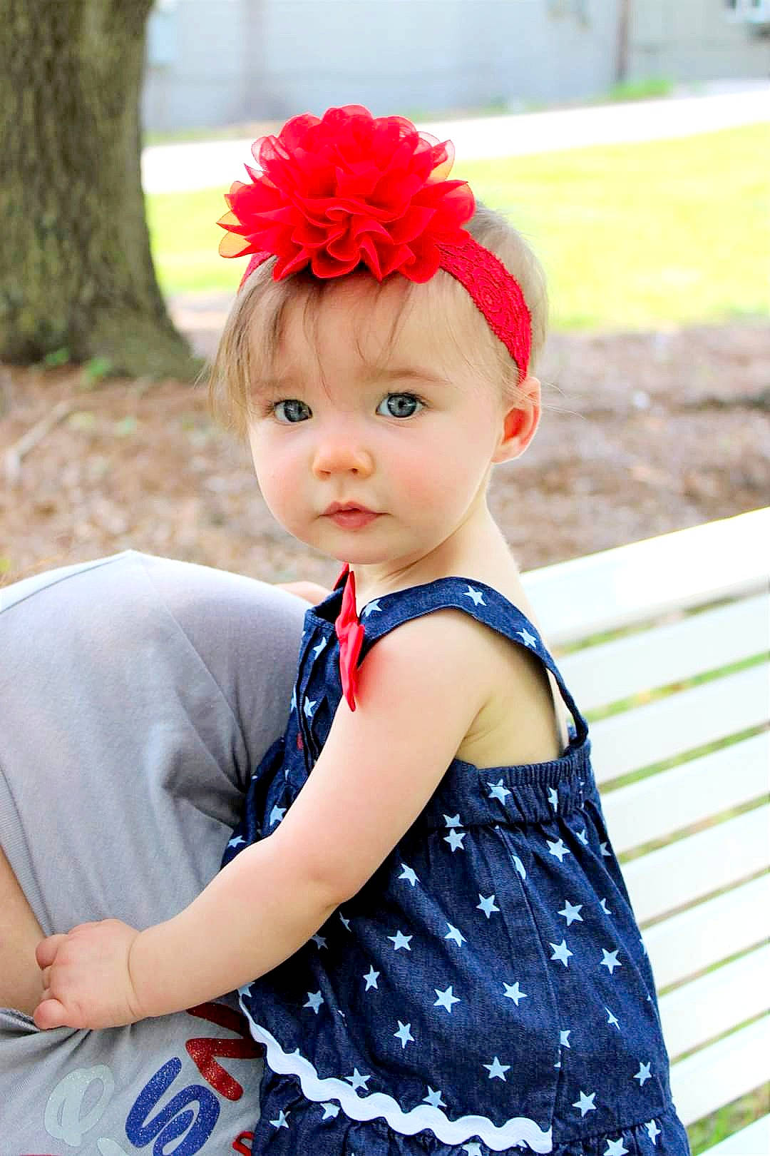 Ansleigh joined the competition — help win amazing prizes! baby_toddler_clothing, bangs, beauty, blond, child, dress, electric_blue, eye, grass, happy, headband, headpiece, headwear, long_hair, pattern, person, pink, plant, red, skin