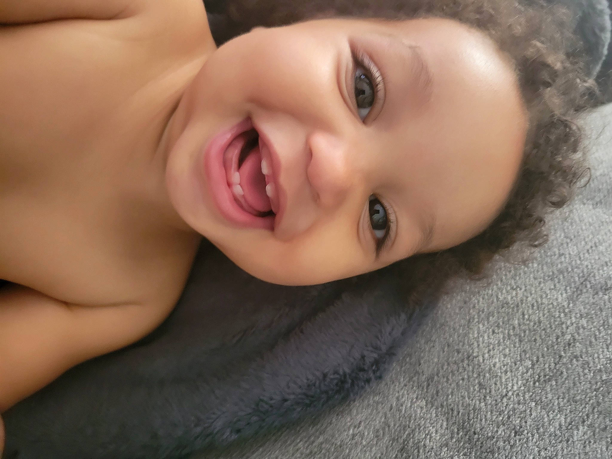 Tiana is registered to the contest to win money with this photo: baby, black_hair, cheek, eye, eyebrow, eyelash, face, flash_photography, forehead, hair, happy, headgear, human_body, iris, joy, lip, mouth, neck, nose, person