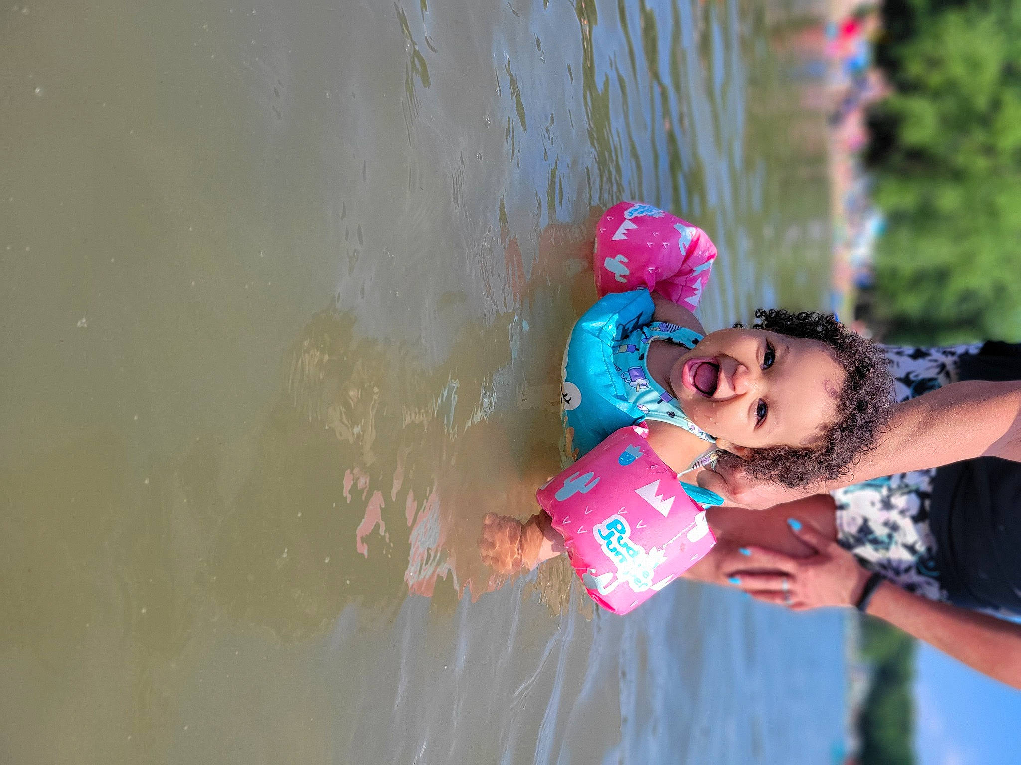 Tiana joined the competition — help win amazing prizes! child, fun, happy, jewellery, leisure, liquid_bubble, magenta, people_in_nature, person, personal_protective_equipment, pink, play, recreation, smile, swimwear, toddler, vacation, water