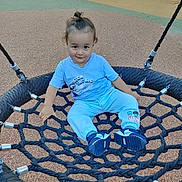 Ayden participe au concours pour gagner de l'argent avec cette photo : toddler, child, playground, swing, rope_swing, blue_clothing, marvel, sneakers, outdoor, daylight, smile, curly_hair, top_knot, play, fun, park, fence, rope, casual, happy