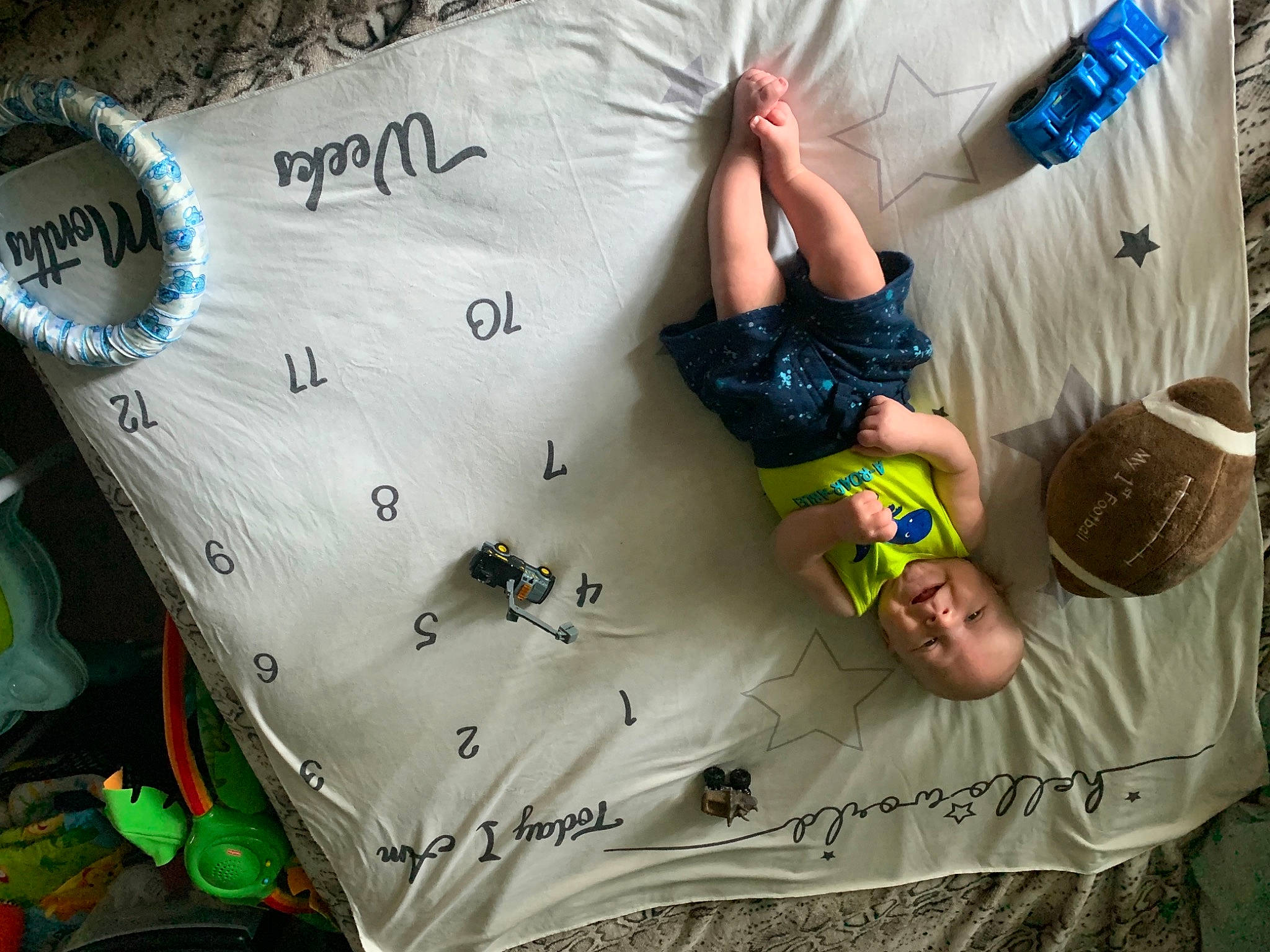 Kolston is registered to the contest to win money with this photo: adventure, advertising, child, climbing, font, fun, grass, happy, hat, leisure, linens, organism, pattern, person, play, product, recreation, shorts, t_shirt, textile