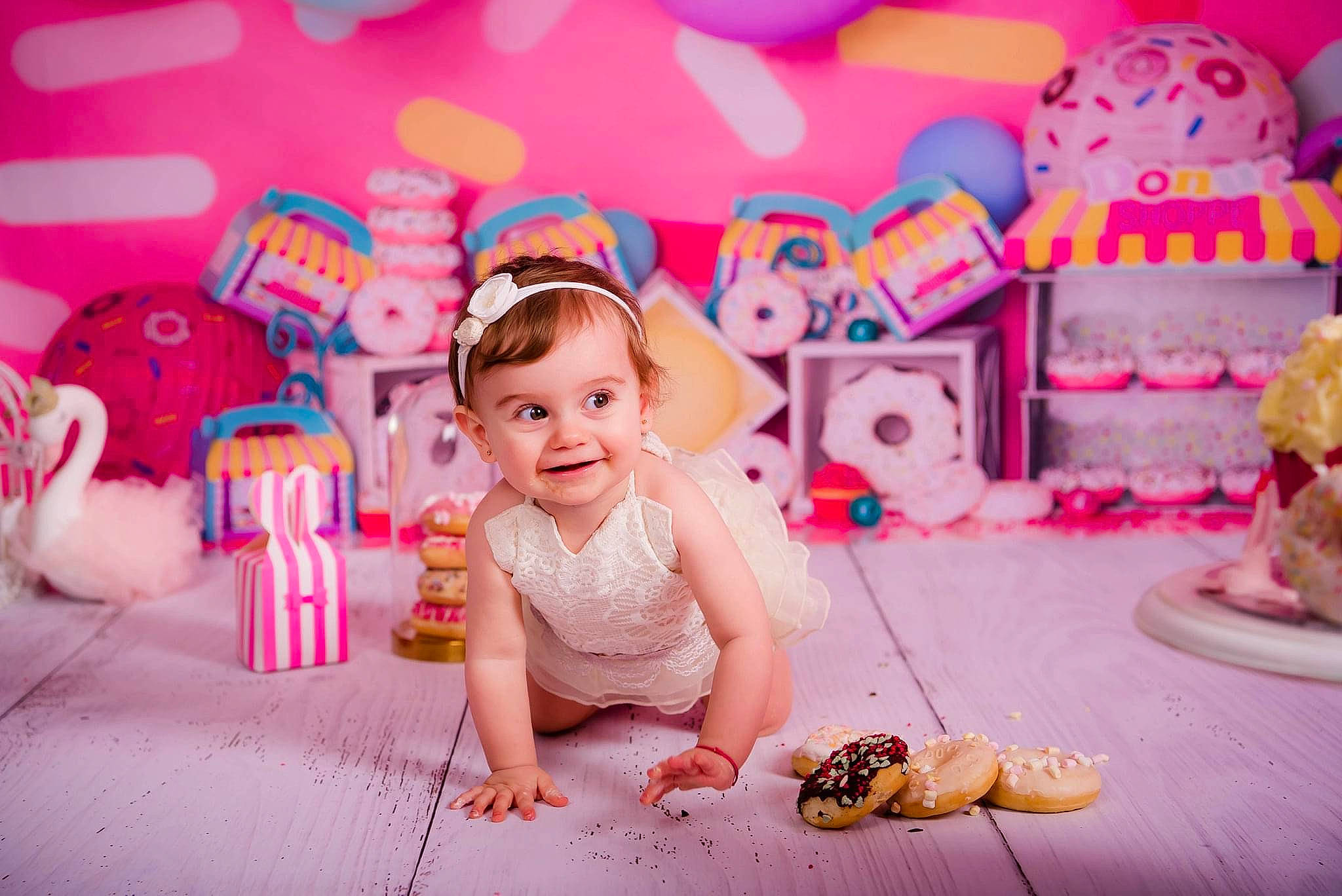 Eléa a rejoint le concours — aidez-le/la à gagner de superbes lots ! baby, baby_toddler_clothing, birthday, birthday_party, child, decoration, dress, event, facial_expression, fun, happy, hat, joy, magenta, party_supply, person, pink, purple, smile, snapshot