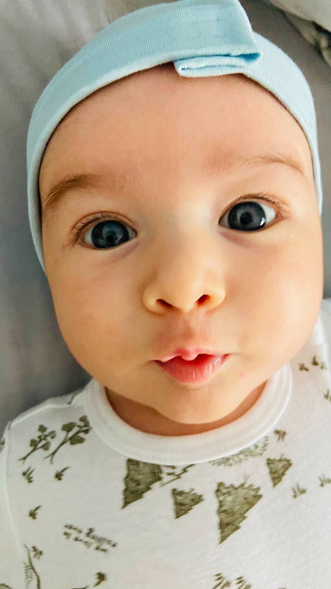 Aidan joined the competition — help win amazing prizes! baby, baby_toddler_clothing, cap, cheek, child, collar, eye, eyebrow, eyelash, face, forehead, headgear, headwear, iris, lip, no_expression, nose, person, skin, sleeve