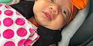 Adalynn joined the competition — help win amazing prizes! baby, infant, newborn, car_seat, headband, orange_bow, blanket, polka_dot, bottle, face, eyes, cheeks, skin, cute, portrait, closeup, seat, fabric, sleepy, adorable