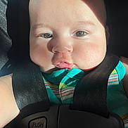 Eithan joined the competition — help win amazing prizes! baby, infant, face, car_seat, safety_harness, child, closeup, skin, eyes, sunlight, stripes, clothing, seatbelt, young_child, cute, portrait, seat, sitting, head, babywearing