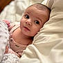 Aurora is registered to the contest to win money with this photo: baby, infant, face, eyes, blanket, pillow, bed, soft, cozy, sleepwear, child, cute, portrait, indoor, skin, expression, newborn, comfort, rest, warm