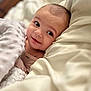 Aurora joined the competition — help win amazing prizes! baby, blanket, bed, cozy, cute, face, infant, indoors, light, looking, nest, person, portrait, sleepwear, smile, soft, toddler, warm, young, cute_expression
