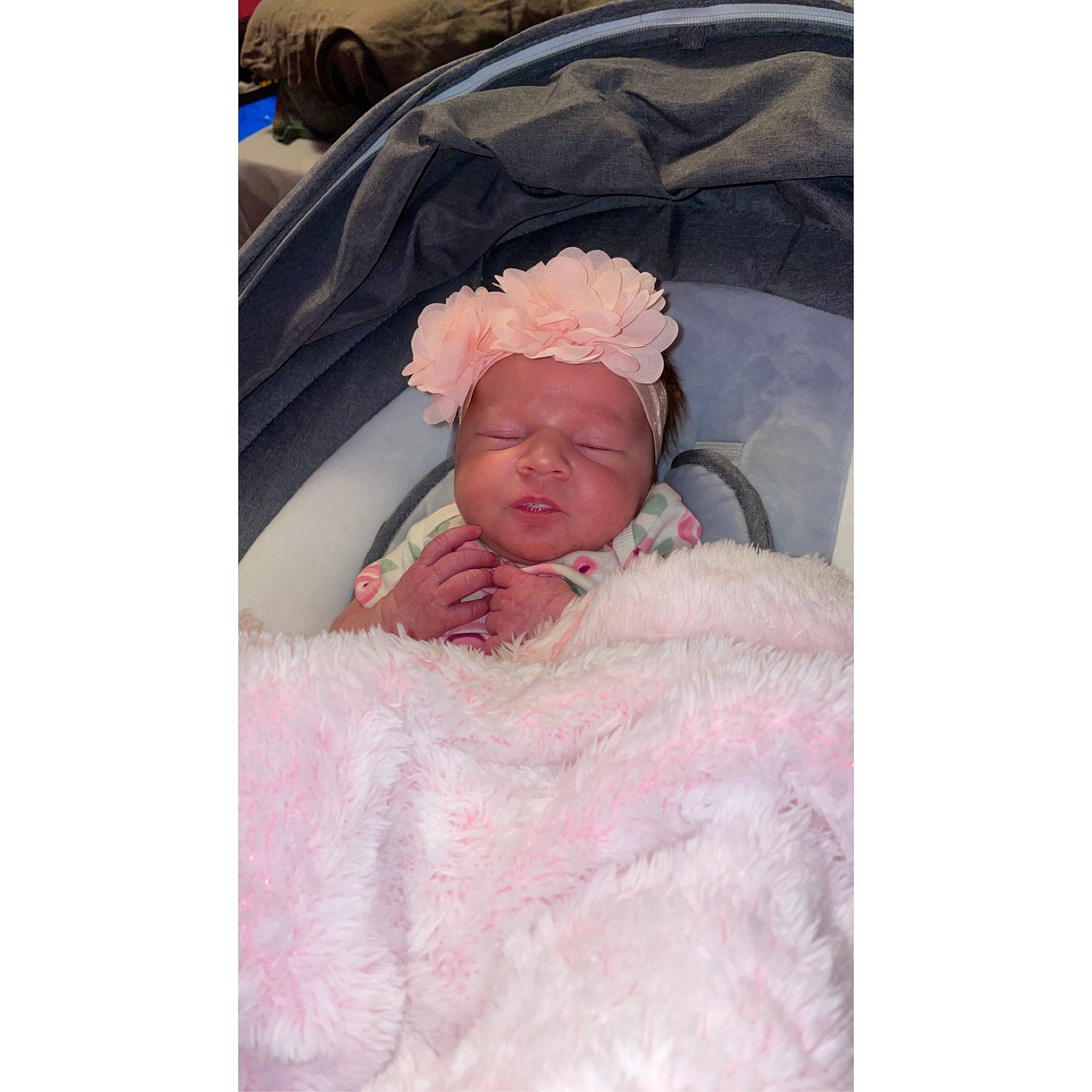 Alexandria is registered to the contest to win money with this photo: baby, baby_sleeping, bedding, child, comfort, event, face, fashion_accessory, fur, happy, headwear, linens, magenta, nap, peach, person, portrait_photography, room, sleep, sleeve