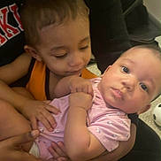 Ameriah joined the competition — help win amazing prizes! baby, child, toddler, holding, cute, indoors, family, love, affection, clothing, person, portrait, face, skin, hands, sitting, expression, bond, caring, young