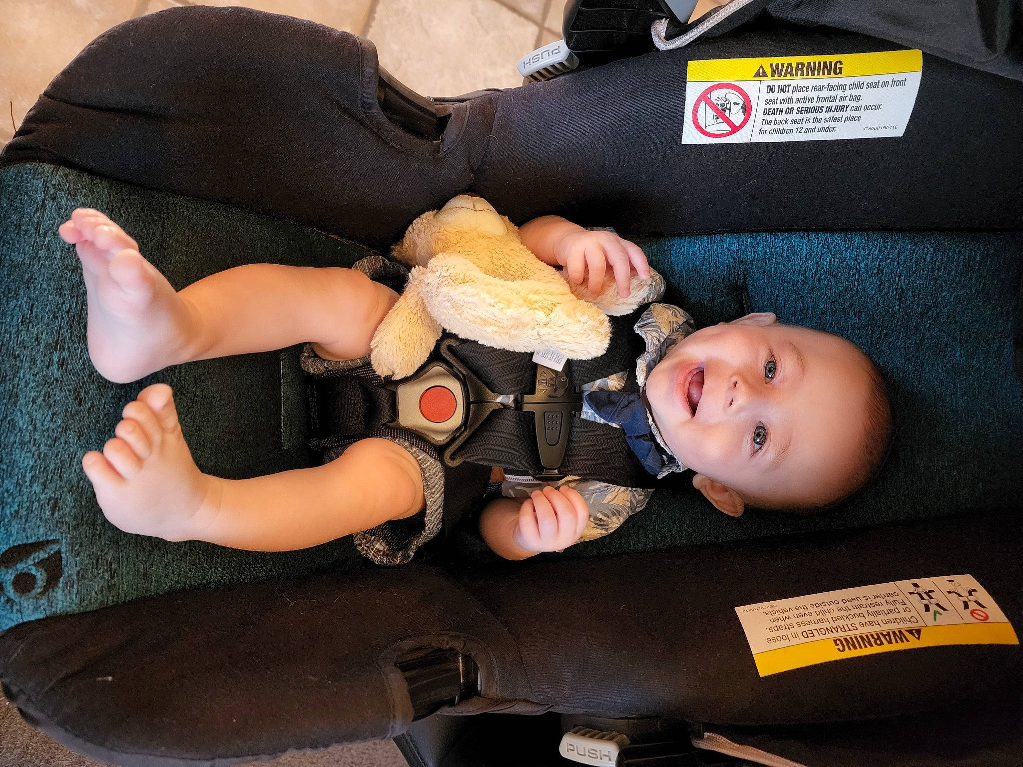 Sammie is registered to the contest to win money with this photo: arm, baby, baby_carriage, baby_products, baby_toddler_clothing, comfort, elbow, finger, fun, gesture, hand, human_body, human_leg, joint, knee, lap, nail, person, shoe, thigh