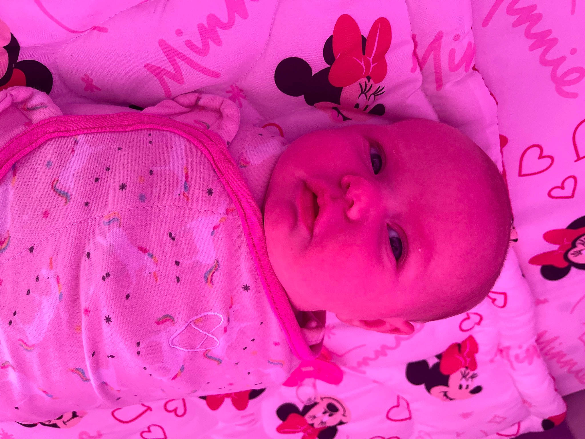 Kamryn is registered to the contest to win money with this photo: baby, baby_toddler_clothing, beauty, cheek, child, eyelash, face, happy, lip, magenta, pattern, person, petal, photograph, pink, purple, skin, smile, textile, toddler