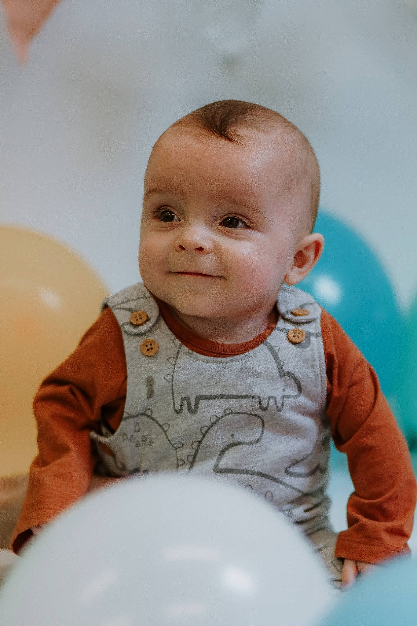 Cayden joined the competition — help win amazing prizes! arm, baby, baby_toddler_clothing, balloon, cheek, child, circle, event, flooring, fun, happy, head, iris, nose, person, sitting, skin, sleeve, smile, t_shirt