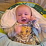 Jayden joined the competition — help win amazing prizes! baby, blanket, blue_blanket, child, clothing, comfort, cozy, cute, face, happy, indoors, infant, lion_king, lying_down, pacifier_clip, portrait, simba, smiling, soft_toys, young