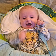 Jayden joined the competition — help win amazing prizes! baby, blanket, blue_blanket, child, clothing, comfort, cozy, cute, face, happy, indoors, infant, lion_king, lying_down, pacifier_clip, portrait, simba, smiling, soft_toys, young