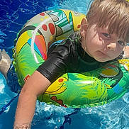 Jensen joined the competition — help win amazing prizes! blue, child, colorful, float, fun, inflatable_ring, leisure, nature, outdoor, person, playful, pool, recreation, summer, sunlight, swimming, swimwear, vacation, water, wet_hair