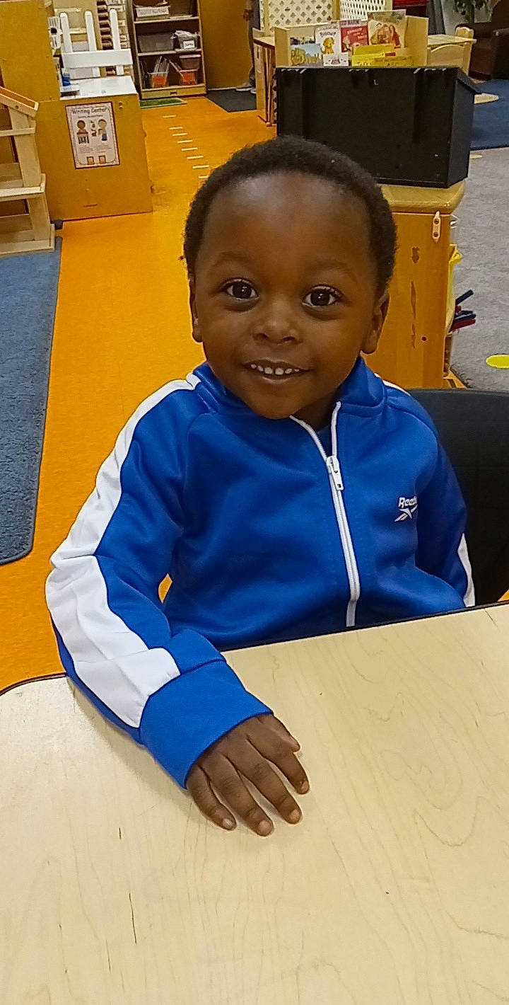 Zyaire joined the competition — help win amazing prizes! child, electric_blue, flooring, fun, happy, job, joy, leisure, person, play, room, sitting, sleeve, smile, t_shirt, table, toddler, uniform