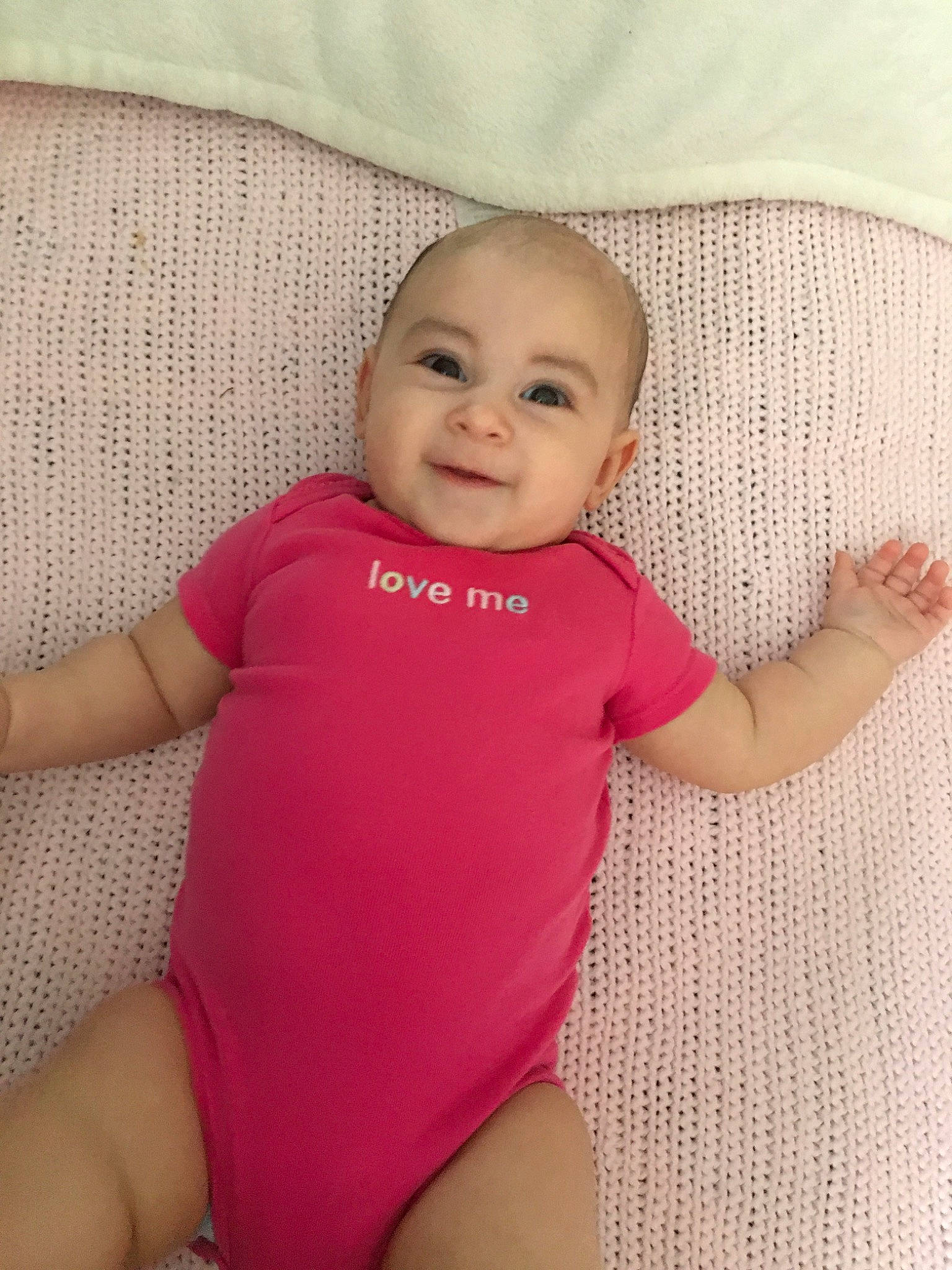 Everleigh joined the competition — help win amazing prizes! arm, baby, baby_products, baby_toddler_clothing, beauty, cheek, child, child_model, face, head, lip, person, pink, product, skin, sleeve, smile, toddler