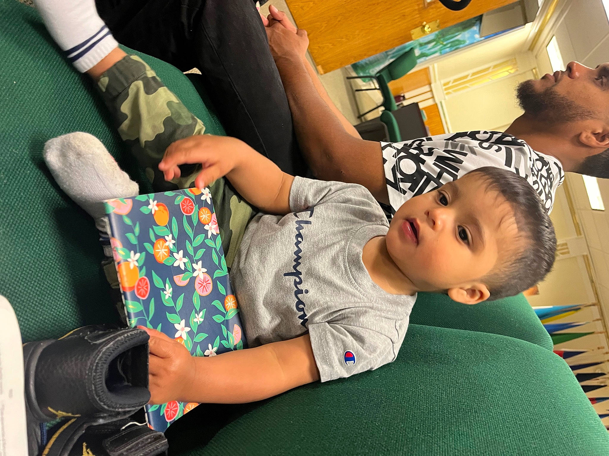 Luis joined the competition — help win amazing prizes! baby, child, comfort, elbow, finger, fun, hand, happy, human_leg, joint, knee, lap, leisure, person, product, room, sitting, sock, thigh, toddler