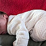 baby, blanket, child, closed_eyes, cozy, cushion, cute, face, head, indoors, infant, laying_down, newborn, peaceful, portrait, red_blanket, rest, sleeping, soft_texture, white_clothing