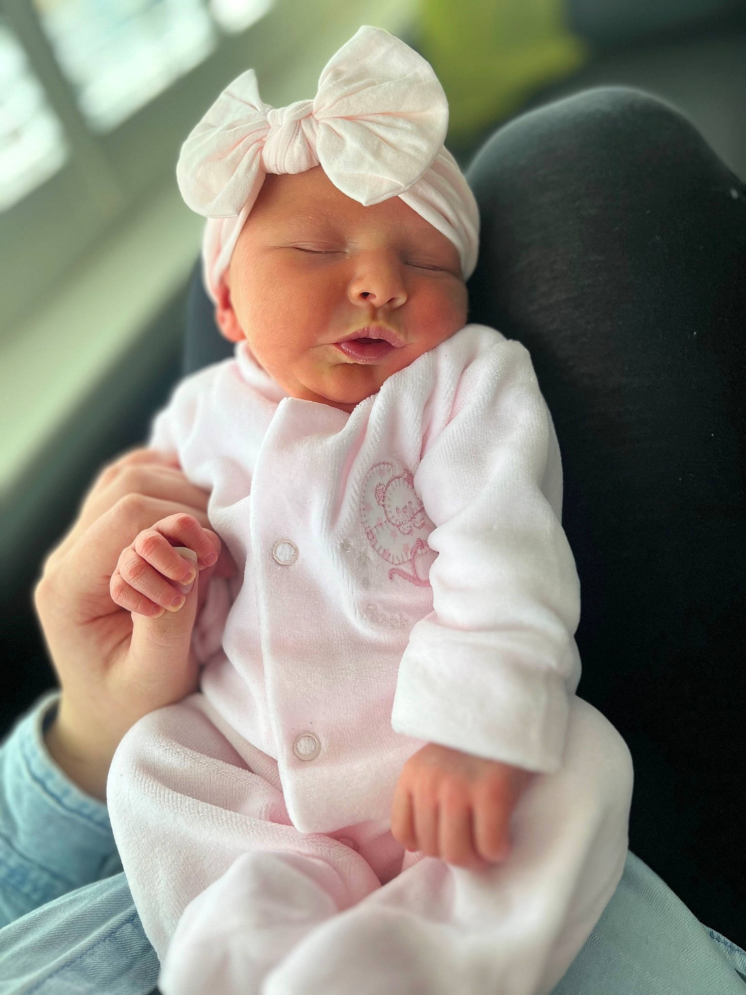 Emilia joined the competition — help win amazing prizes! baby, baby_toddler_clothing, cap, cheek, child, collar, comfort, fashion_accessory, gesture, happy, hat, headwear, linens, peach, person, pink, portrait_photography, sitting, sleeve, thumb