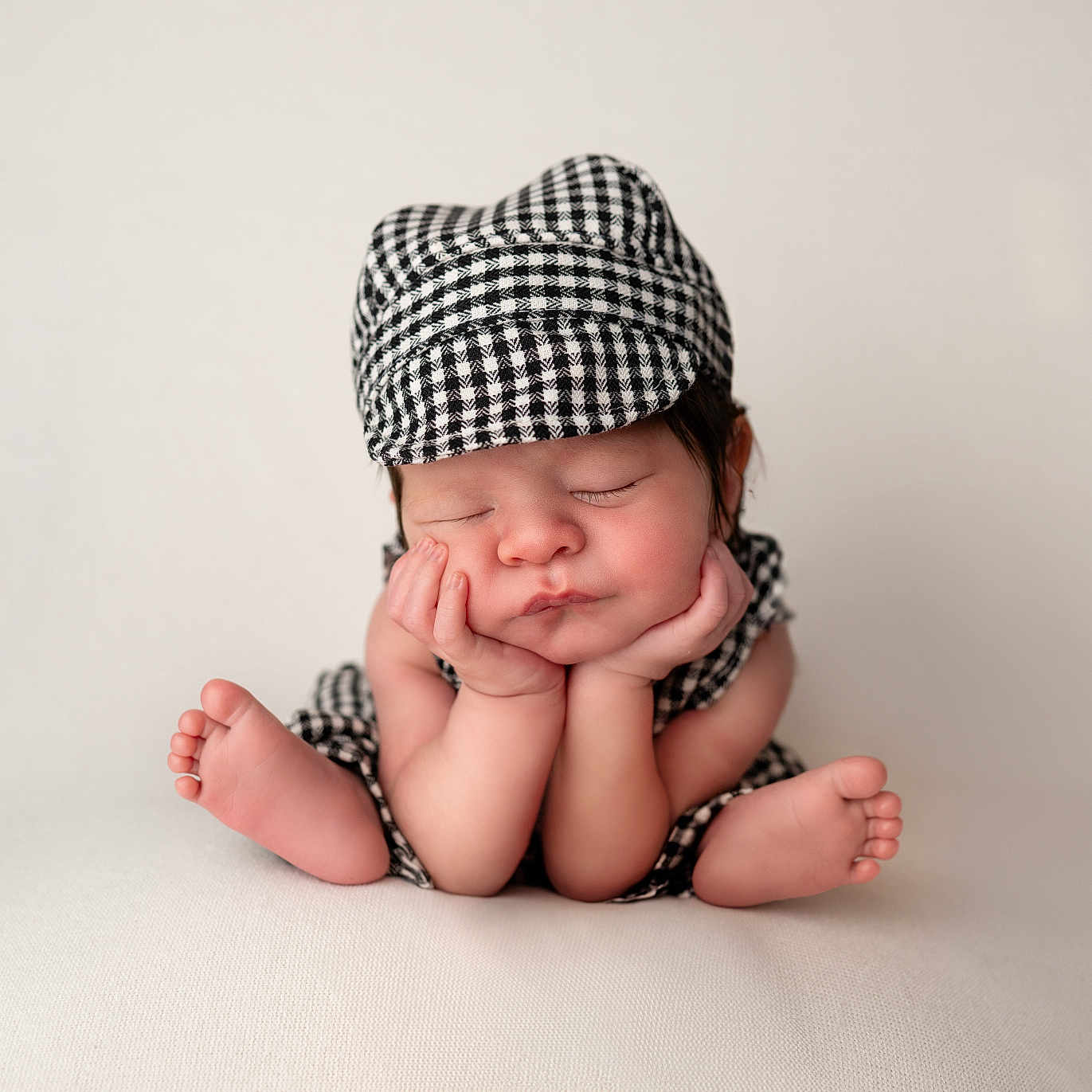 Brayden is registered to the contest to win money with this photo: baby, babylaughing, beanie, bodypart, bonnet, cap, clothing, face, finger, hand, happy, hat, head, newborn, person, photography, portrait, sleeping, smile