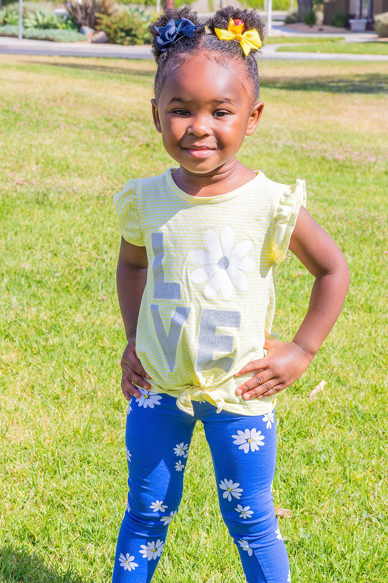 Jessica is registered to the contest to win money with this photo: baby, baby_toddler_clothing, child, grass, hair_accessory, happy, headband, joy, pattern, person, plant, play, smile, summer, t_shirt, toddler, yellow