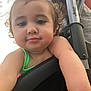 toddler, child, curly_hair, close_up, selfie, face, arm, stroller, outdoor, sunlight, water_reflection, green_clothing, baby, cute, portrait, person, happy, young_child, skin, daylight