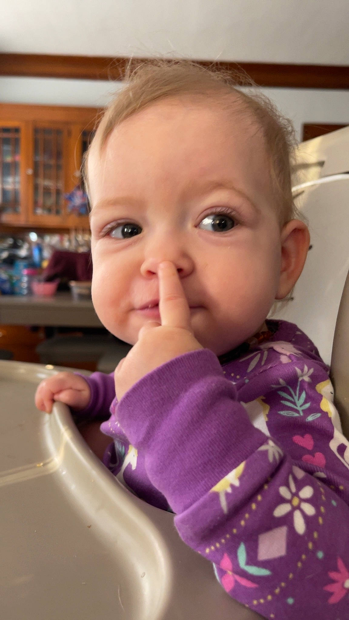 Isabella is registered to the contest to win money with this photo: baby, baby_toddler_clothing, cheek, drinkware, ear, eyebrow, eyelash, fun, gesture, happy, iris, lip, nail, nose, person, purple, skin, sleeve, smile, thumb