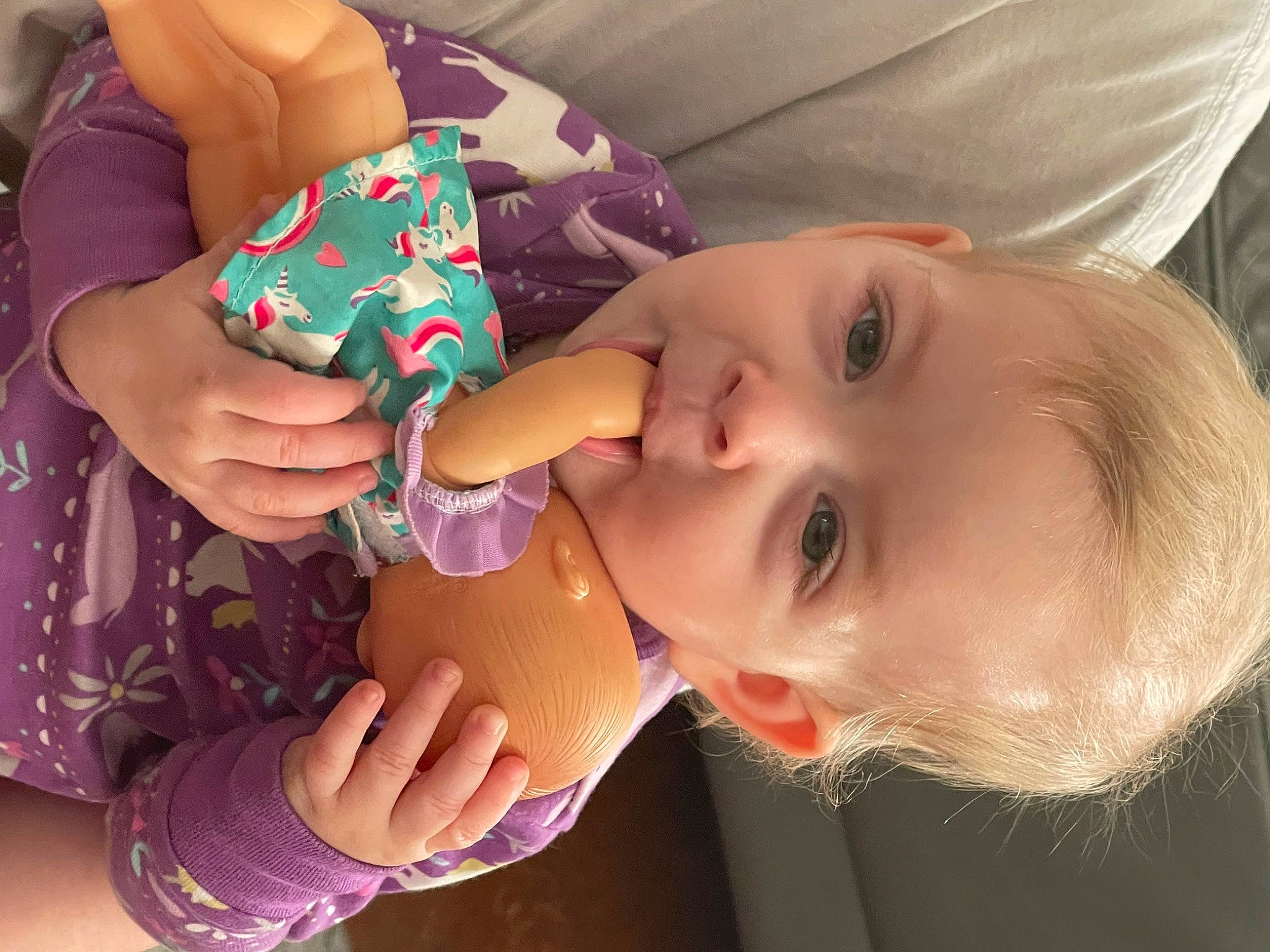 Isabella is registered to the contest to win money with this photo: arm, baby, baby_toddler_clothing, cheek, eyelash, face, finger, food, gesture, hand, happy, lip, mouth, nail, neck, nose, person, skin, smile, toddler