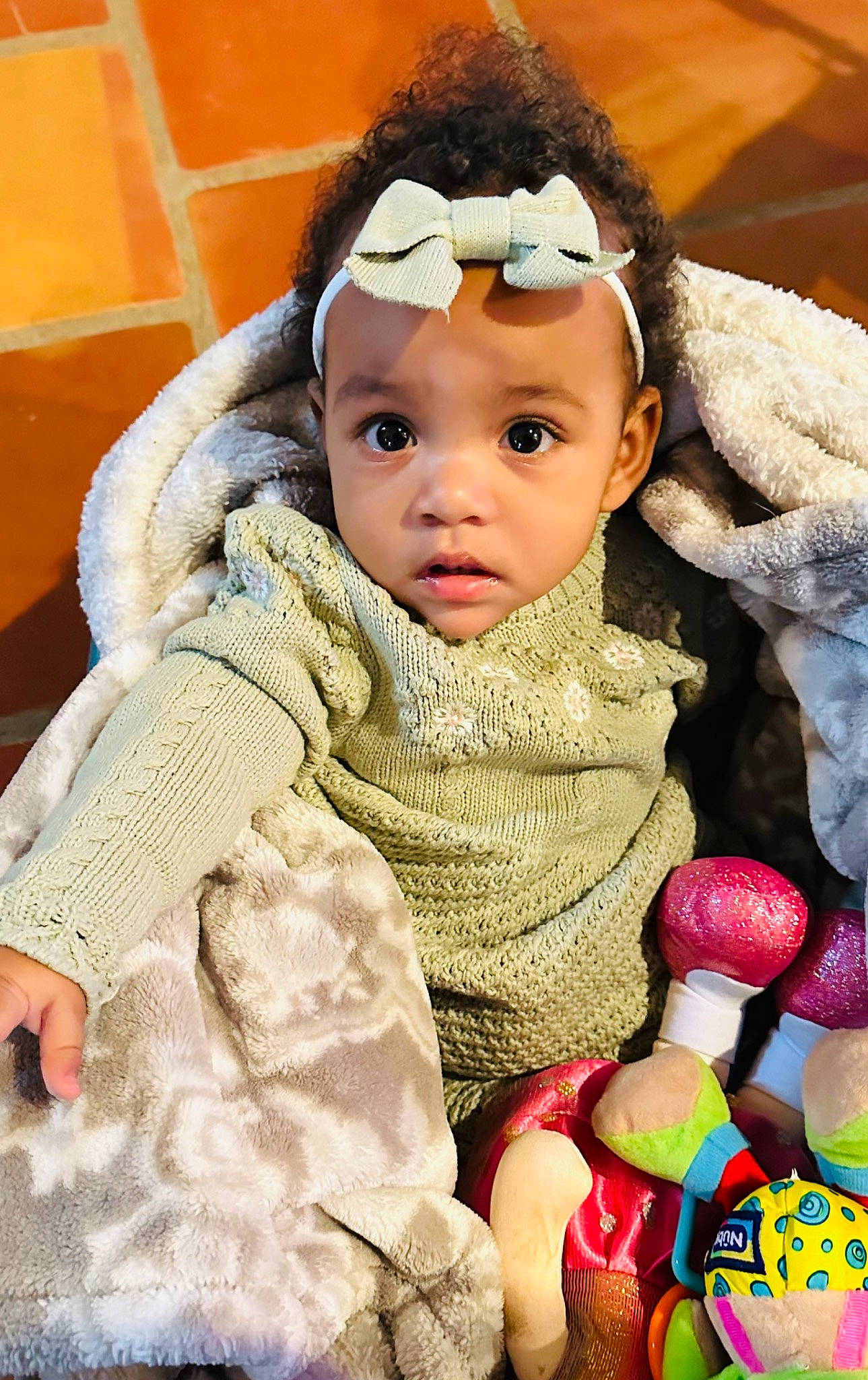 Angela is registered to the contest to win money with this photo: baby, baby_products, baby_toddler_clothing, beanie, beauty, cap, cheek, child, comfort, fashion_accessory, fun, fur, happy, headgear, headwear, knit_cap, nose, people, person, skin