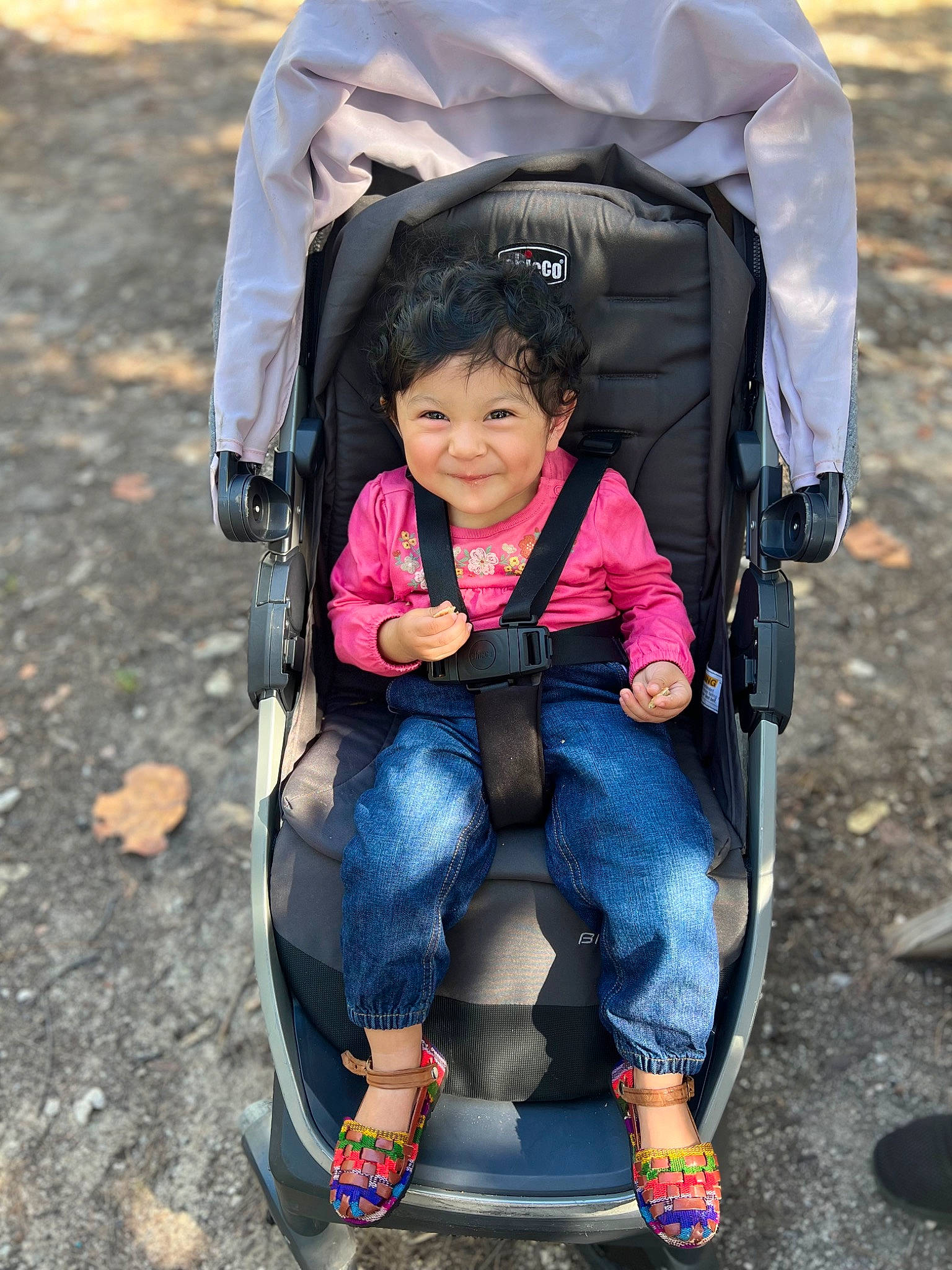 Alaia joined the competition — help win amazing prizes! baby_carriage, baby_products, bag, child, comfort, electric_blue, face, fun, jeans, joy, leisure, person, plant, product, recreation, sitting, smile, sneakers, tire, toddler